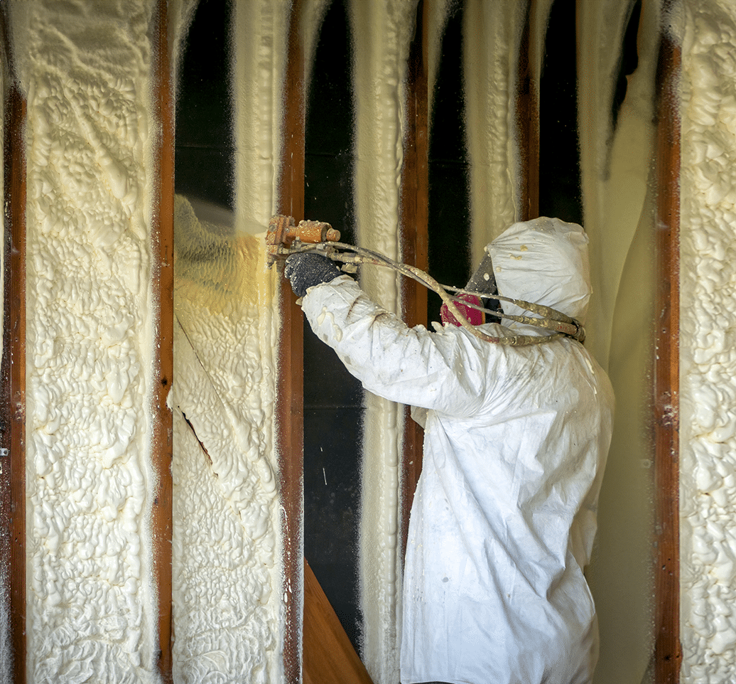 man spraying foam insulation for Sooner Foam Insulation